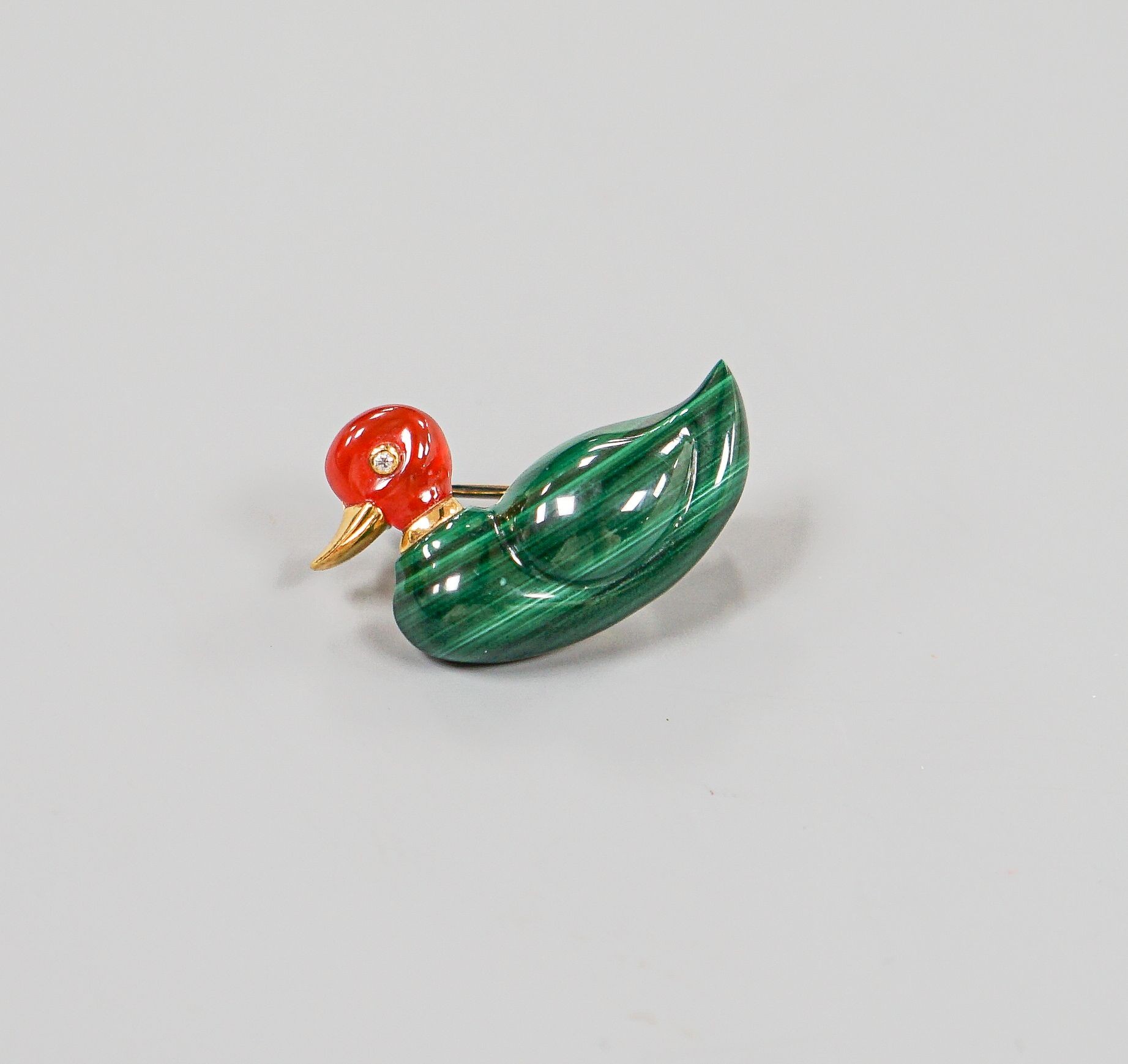 A modern 18ct gold, malachite, carnelian and diamond set clip brooch, modelled as a duck